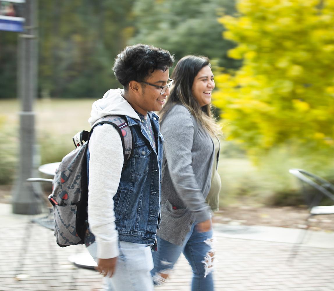 students walking past outdoors